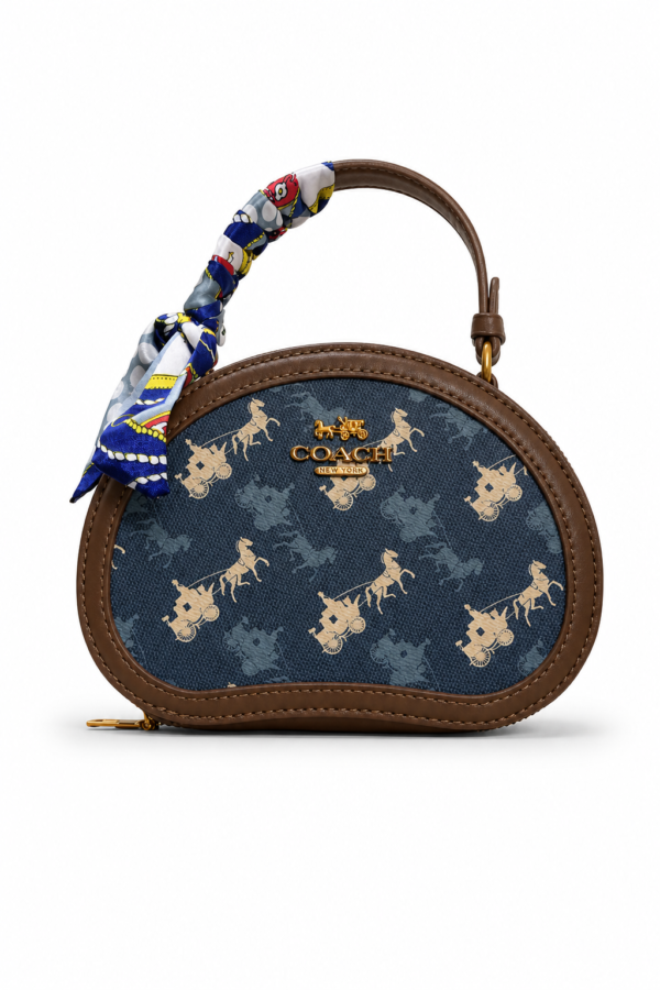 COACH Oval navy blue pattern handbag for women with brown leather Egypt