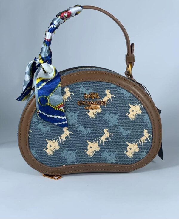 COACH Oval navy blue pattern handbag for women with brown leather Egypt