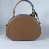 COACH Oval navy blue pattern handbag for women with brown leather Egypt