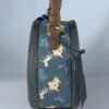 COACH Oval navy blue pattern handbag for women with brown leather Egypt