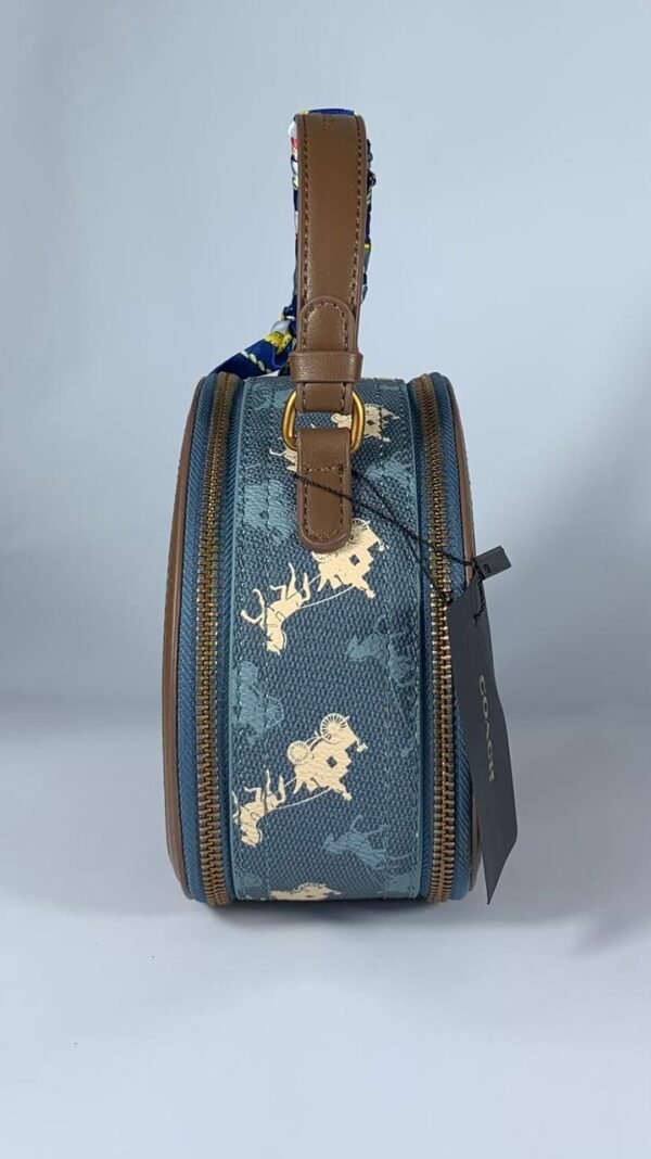 COACH Oval navy blue pattern handbag for women with brown leather Egypt