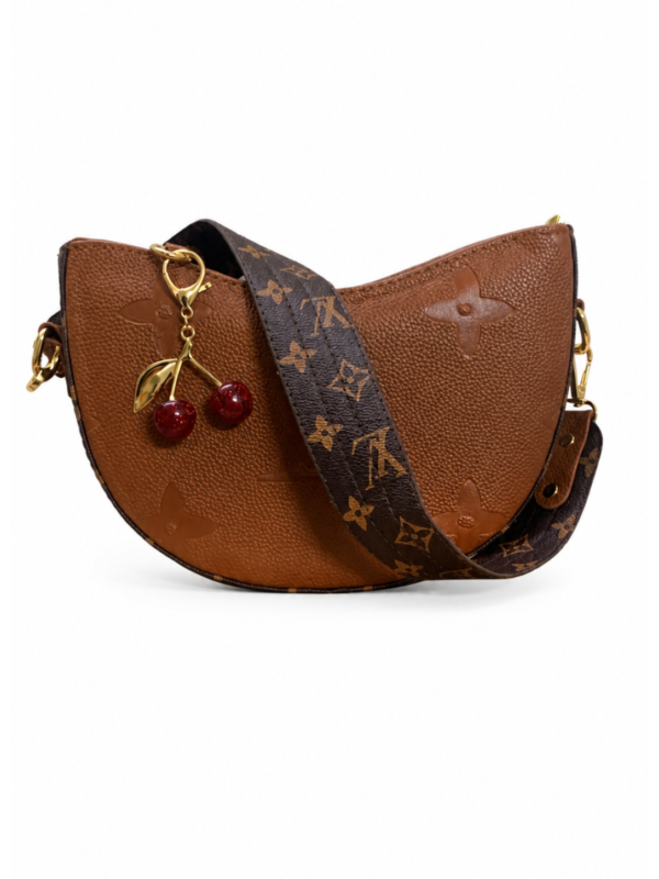 Brown leather shoulder bag for women with charm accessory Egypt