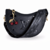 Black leather shoulder bag for women with charm accessory Egypt
