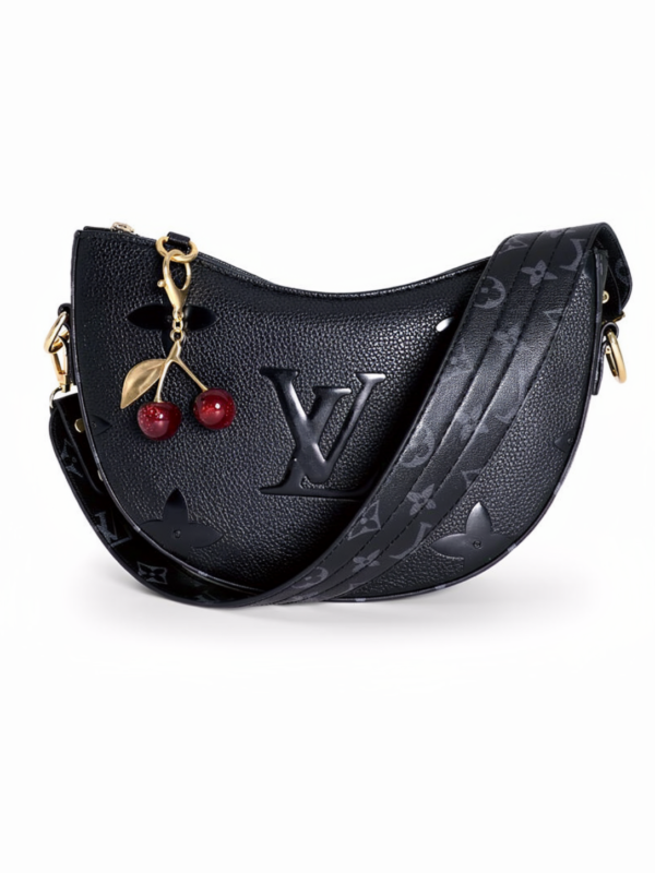 Black leather shoulder bag for women with charm accessory Egypt