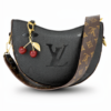 Black and brown leather shoulder bag for women with charm accessory Egypt