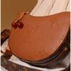 Brown leather shoulder bag for women with charm accessory Egypt