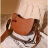 Brown leather shoulder bag for women with charm accessory Egypt