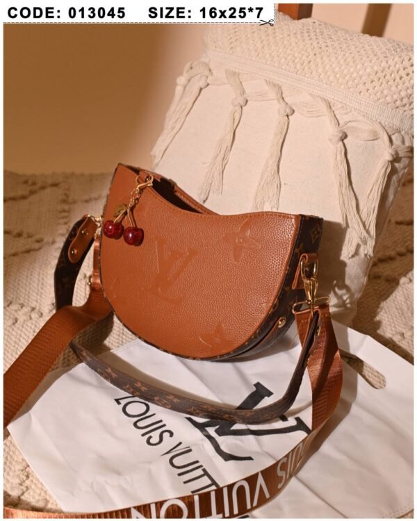 Brown leather shoulder bag for women with charm accessory Egypt