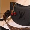 Black and brown leather shoulder bag for women with charm accessory Egypt