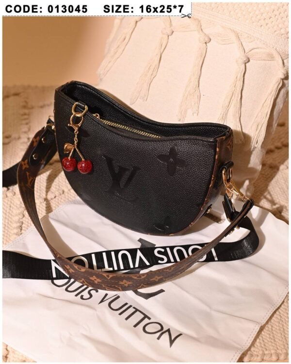 Black and brown leather shoulder bag for women with charm accessory Egypt